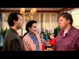 scene from Groundhog Day movie, three guys talking